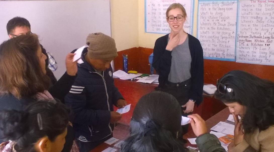 A Global Gap volunteer helps a group of local teachers with English pronunciation in Peru. Local teachers receive assistance with their English pronunciation from a volunteer on her Global Gap Year abroad in Peru.